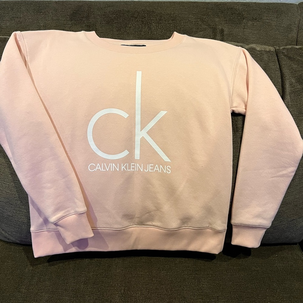 Calvin Klein Jeans size S. Like new light salmon color in perfect conditions.